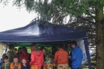Tag-der-Artenvielfalt-20-NABU-Infostand-im-Regen-10x13s